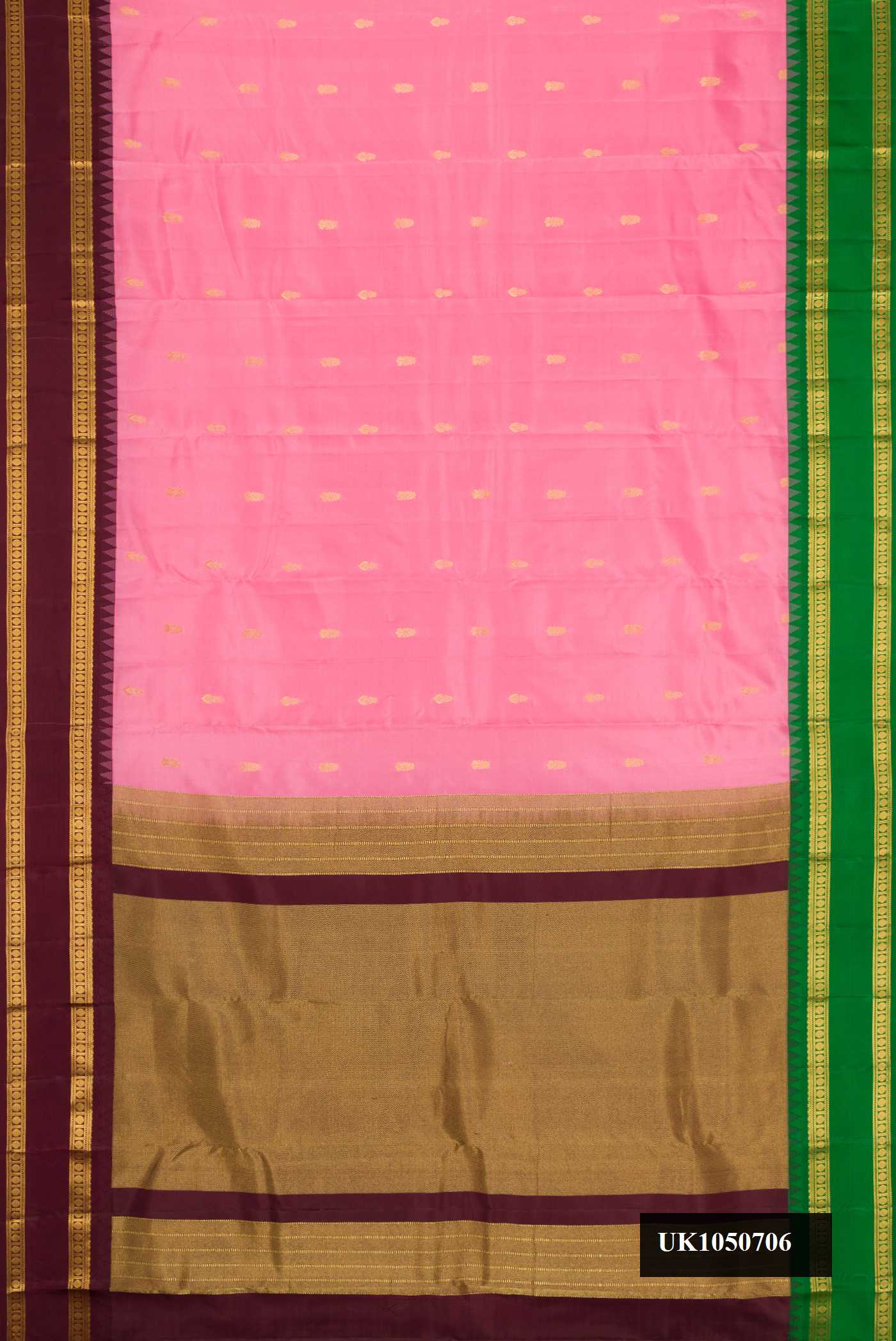Pink Dual Tone Kanchipuram Silk Saree with Zari Butta on the body and Ganga Jamuna Border.  displayed on a mannequin