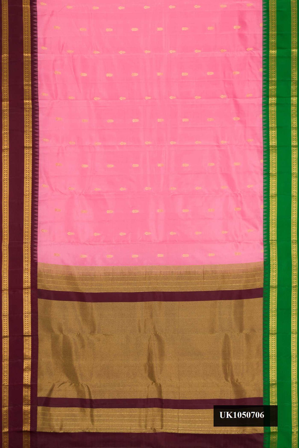Pink Dual Tone Kanchipuram Silk Saree with Zari Butta on the body and Ganga Jamuna Border.  displayed on a mannequin