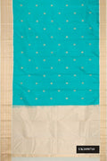 Sky Blue Dual Tone Kanchipuram Silk Saree with Zari Butta on the body and Zari Border.  displayed on a mannequin