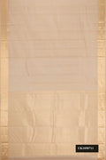 Beige Dual Tone Kanchipuram Silk Saree with Jacquard With Zari Butta on the body and Zari Border.  displayed on a mannequin