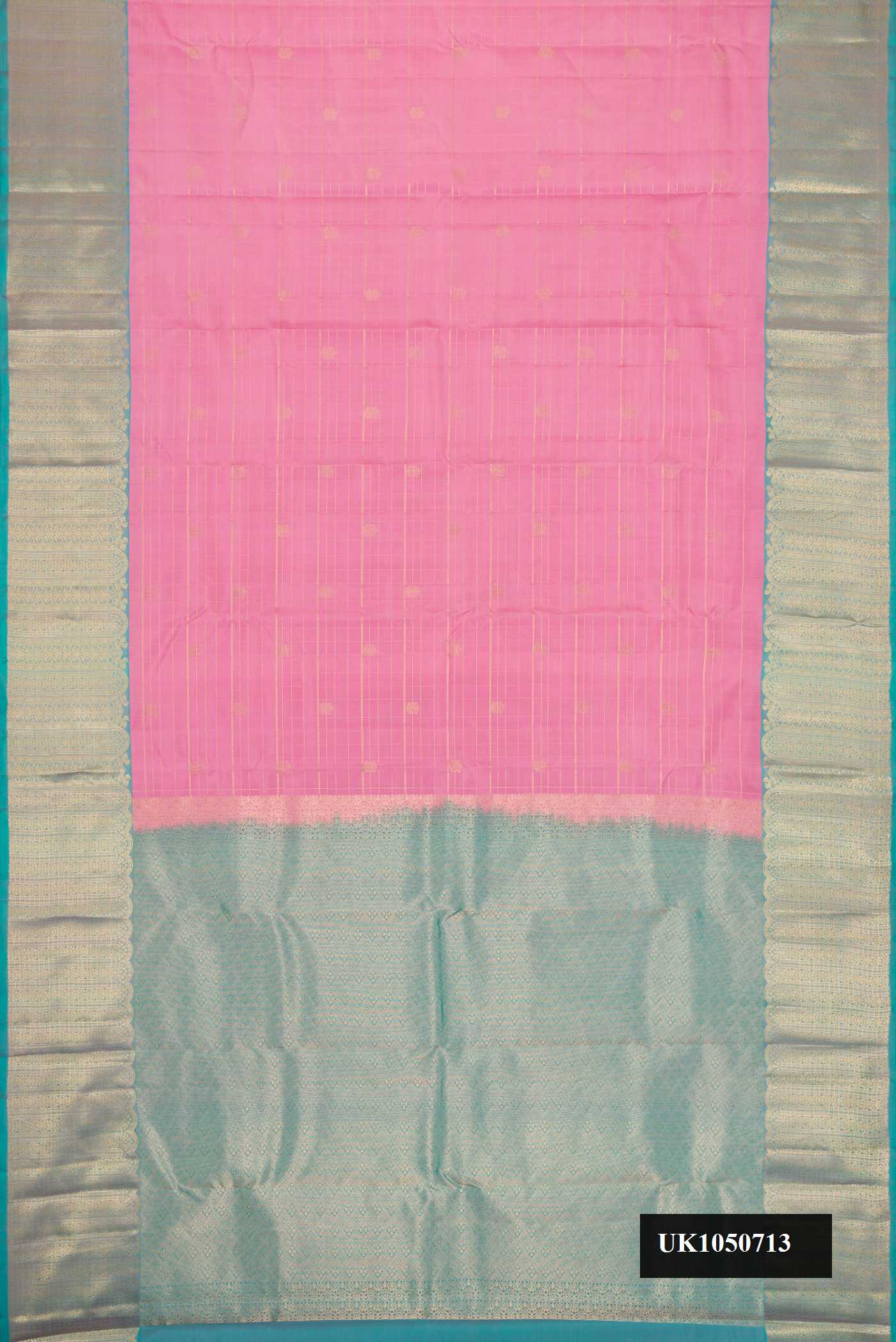 Pink Dual Tone Kanchipuram Silk Saree with Checked design on the body and Zari Border.  displayed on a mannequin