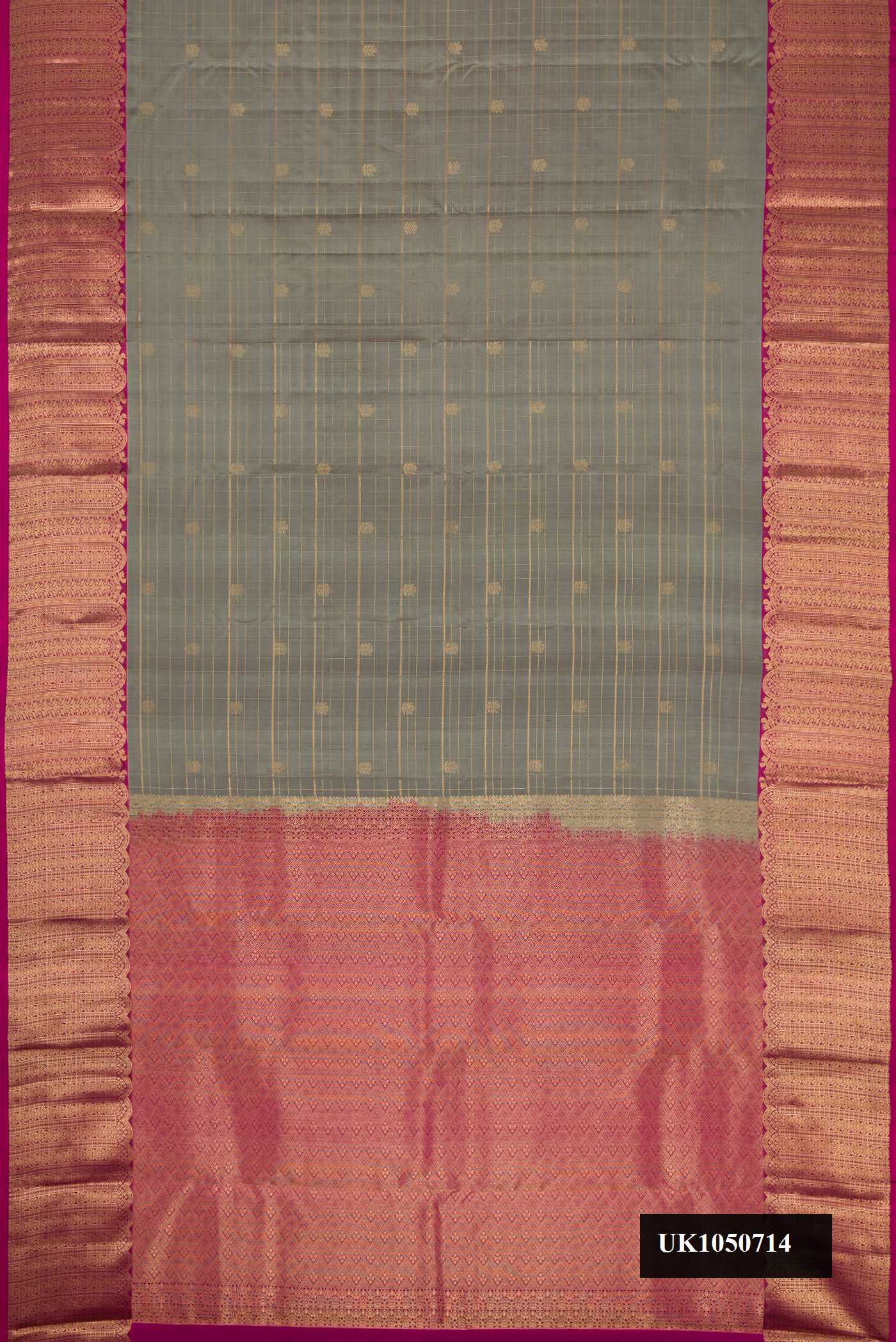 Grey Dual Tone Kanchipuram Silk Saree with Checked design on the body and Zari Border.  displayed on a mannequin