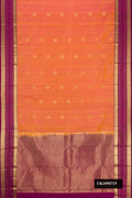 Orange Dual Tone Kanchipuram Silk Saree with Zari Butta on the body and Zari Border.  displayed on a mannequin