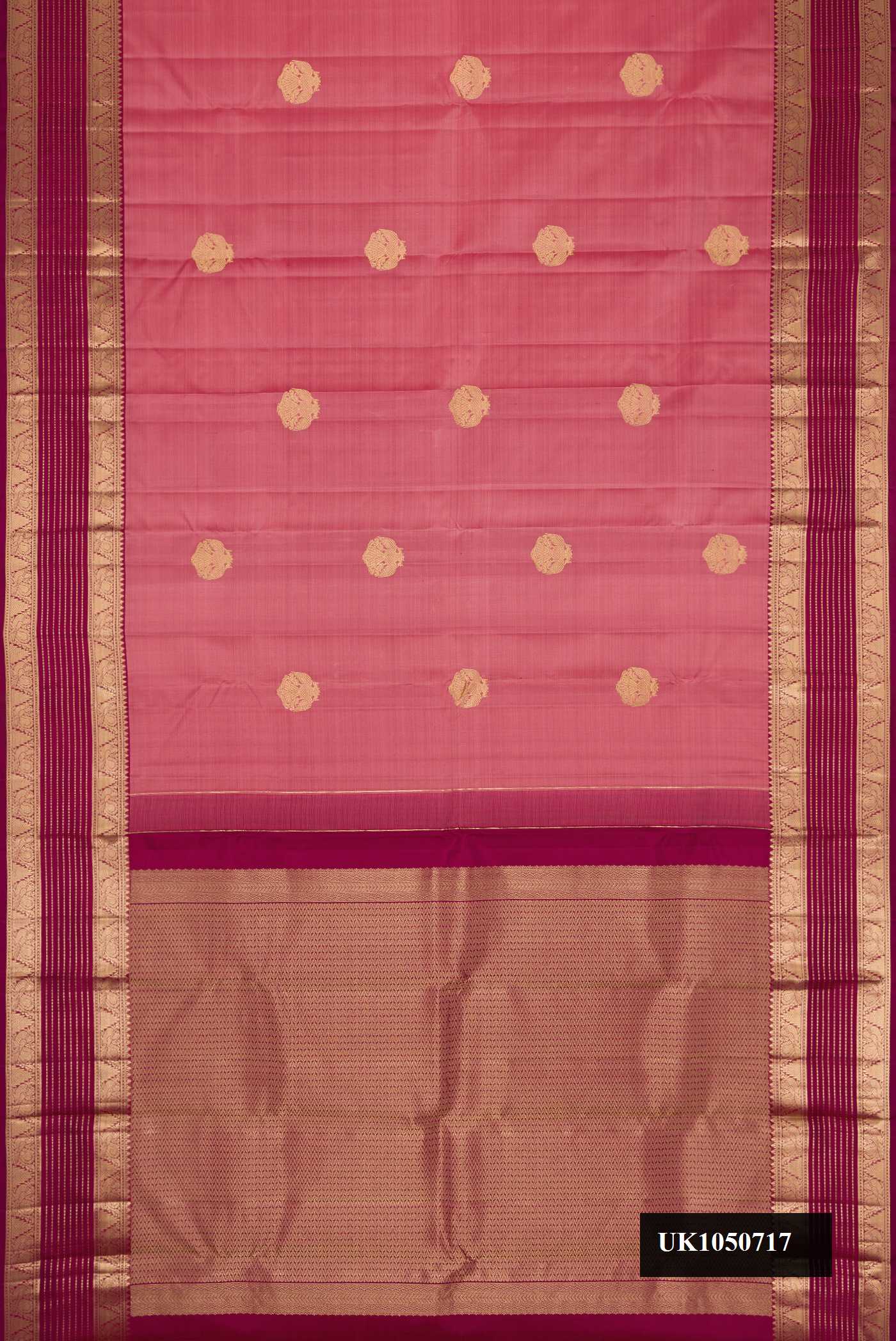 Pink Dual Tone Kanchipuram Silk Saree with Zari Butta on the body and Zari Border.  displayed on a mannequin
