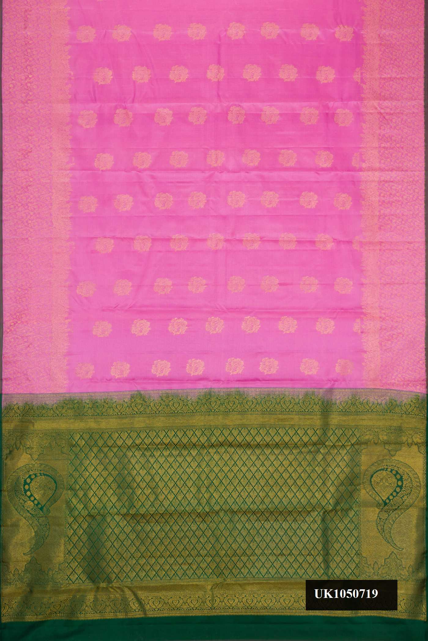 Pink Dual Tone Kanchipuram Silk Saree with Zari Butta on the body and Zari Border.  displayed on a mannequin