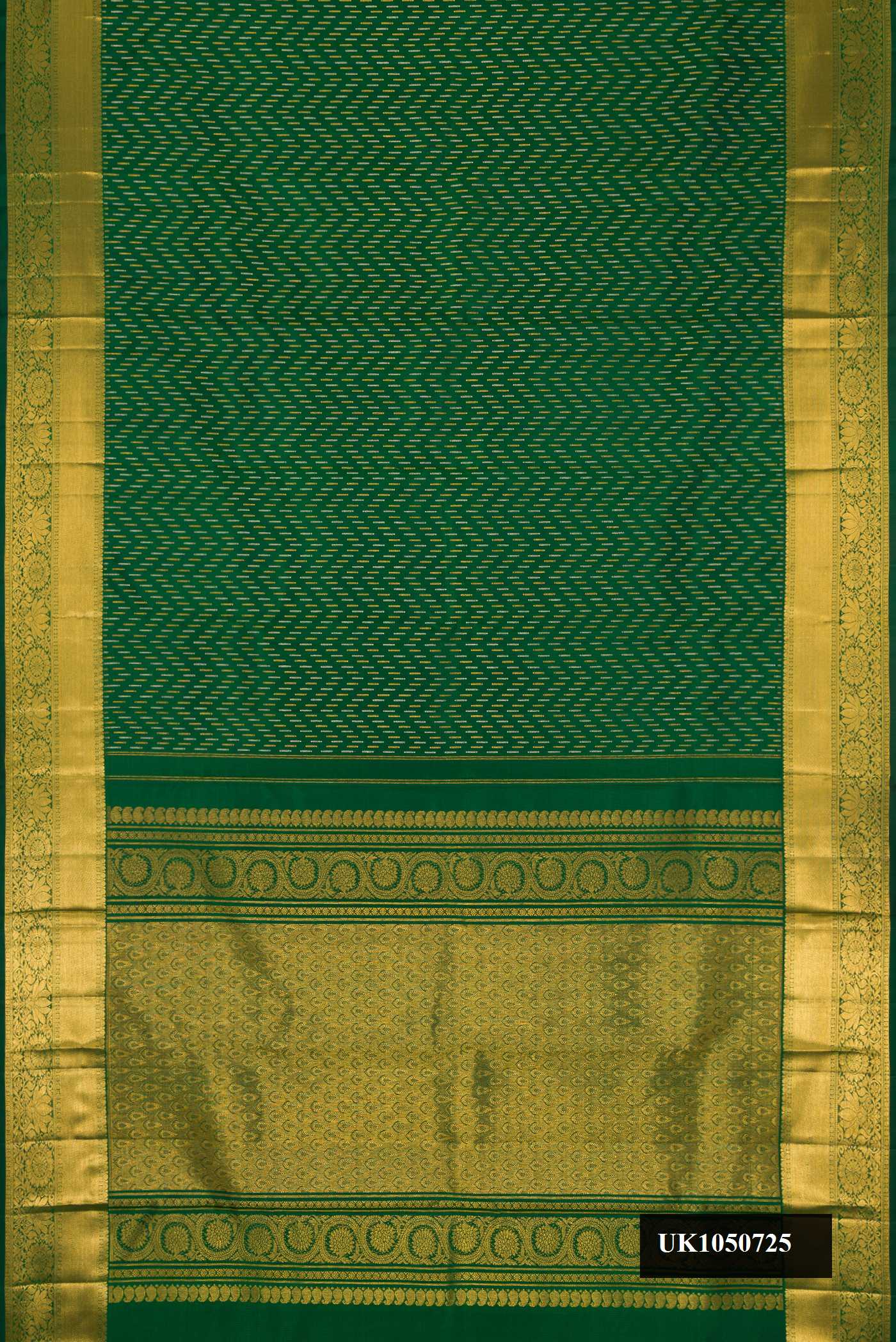Bottle Green Dual Tone Kanchipuram Silk Saree with Zari Butta on the body and Zari Border.  displayed on a mannequin