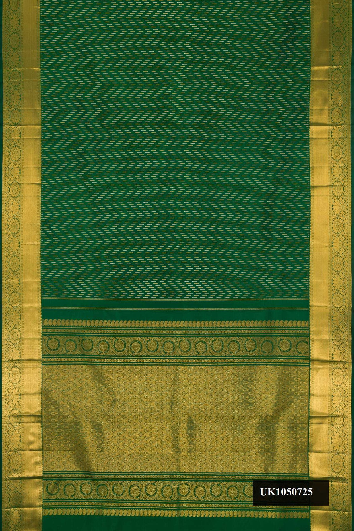 Bottle Green Dual Tone Kanchipuram Silk Saree with Zari Butta on the body and Zari Border.  displayed on a mannequin