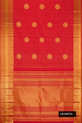 Red Dual Tone Kanchipuram Silk Saree with Checked design on the body and Zari Border.  displayed on a mannequin
