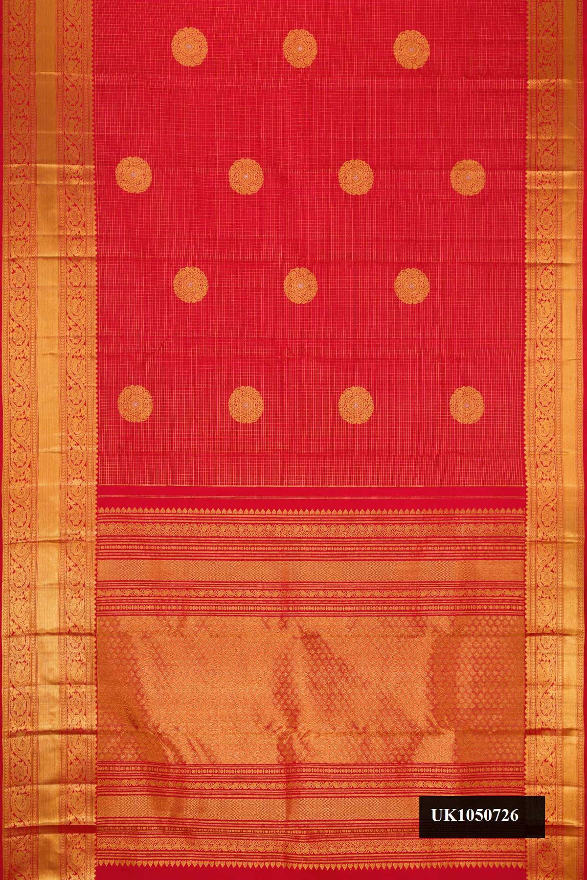 Red Dual Tone Kanchipuram Silk Saree with Checked design on the body and Zari Border.  displayed on a mannequin