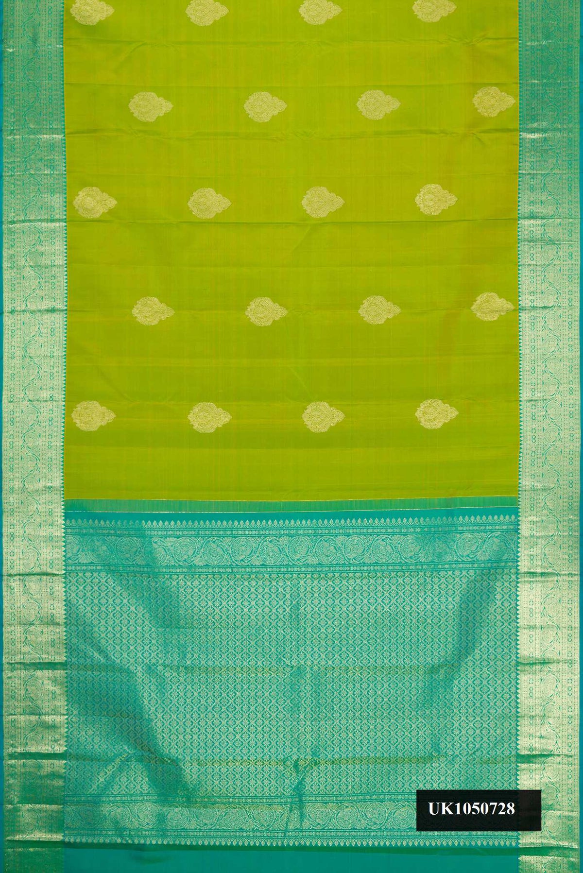 Parrot Green Dual Tone Kanchipuram Silk Saree with Zari Butta on the body and Zari Border.  displayed on a mannequin