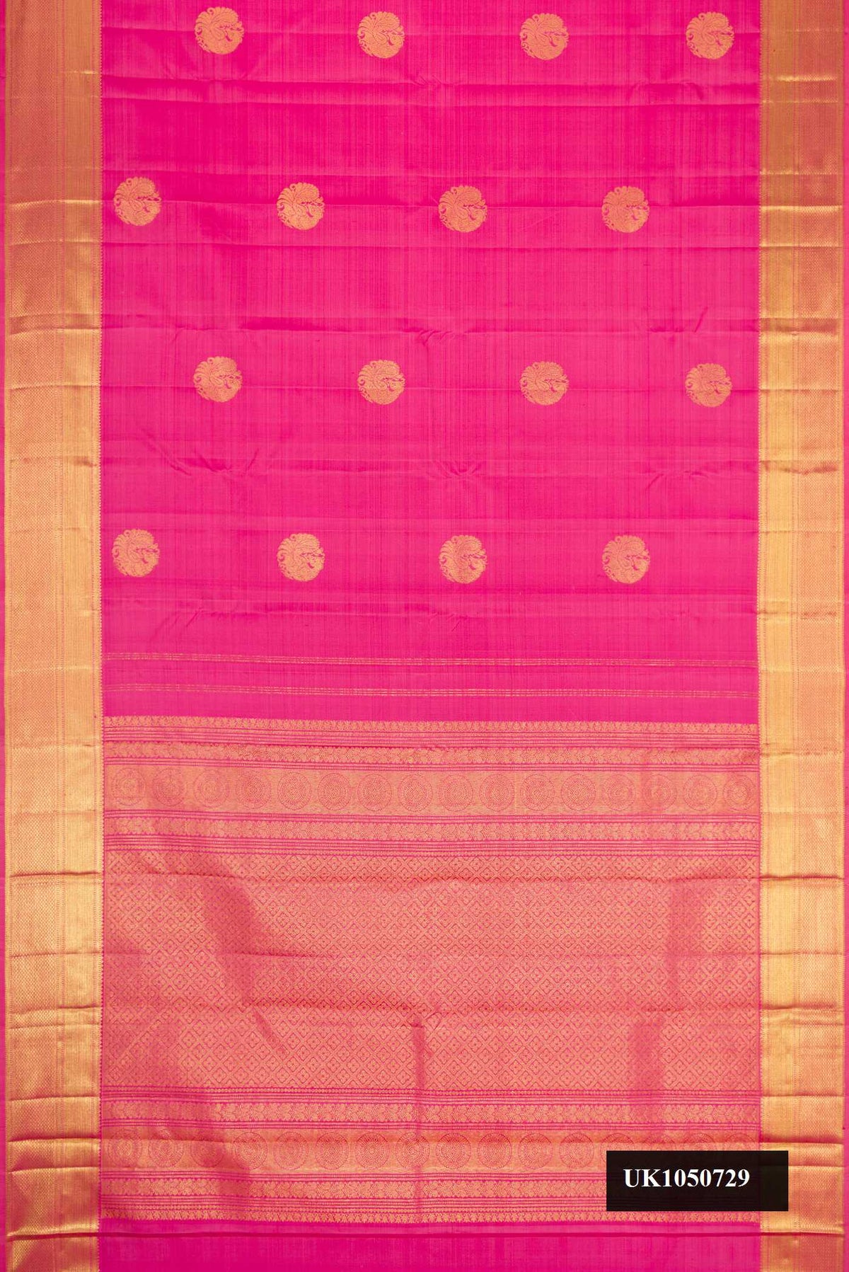 Pink Dual Tone Kanchipuram Silk Saree with Zari Butta on the body and Zari Border.  displayed on a mannequin