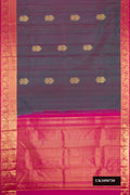 Purple Dual Tone Kanchipuram Silk Saree with Zari Butta on the body and Zari Border.  displayed on a mannequin