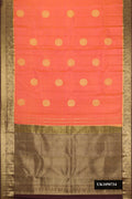 Peach Dual Tone Kanchipuram Silk Saree with Zari Butta on the body and Zari Border.  displayed on a mannequin