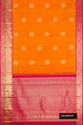 Mustard Dual Tone Kanchipuram Silk Saree with Zari Butta on the body and Zari Border.  displayed on a mannequin