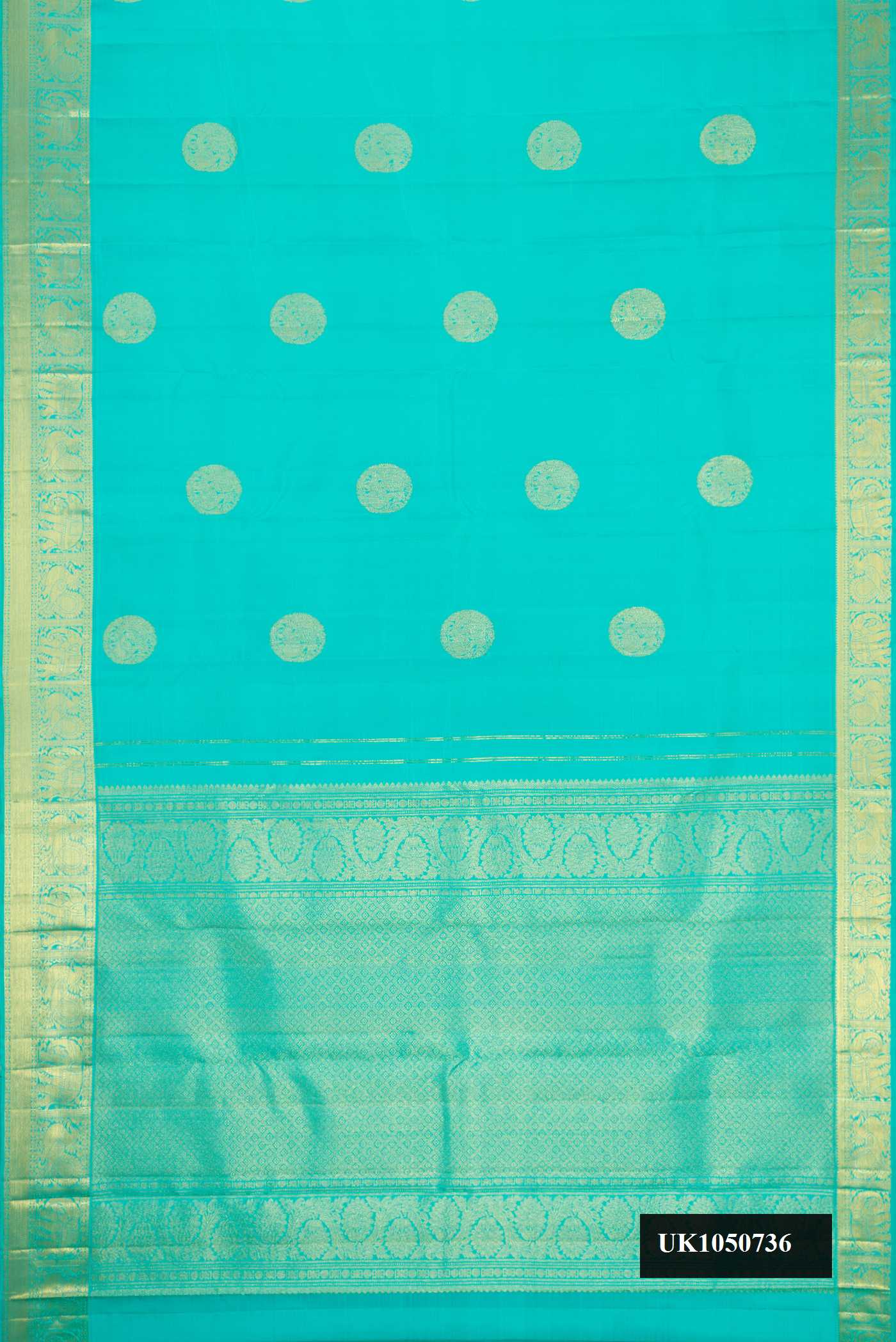 Sky Blue Dual Tone Kanchipuram Silk Saree with Zari Butta on the body and Zari Border.  displayed on a mannequin