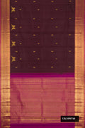 Coffee Brown Dual Tone Kanchipuram Silk Saree with Zari Butta on the body and Zari Border.  displayed on a mannequin