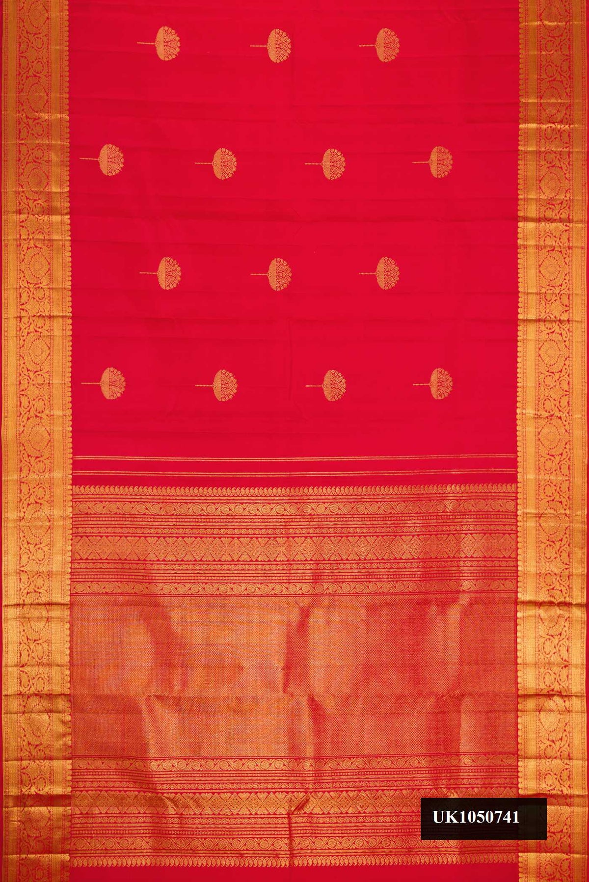 Red Dual Tone Kanchipuram Silk Saree with Zari Butta on the body and Zari Border.  displayed on a mannequin