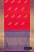 Brick Orange Dual Tone Kanchipuram Silk Saree with Zari Butta on the body and Zari Border.  displayed on a mannequin