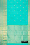 Sky Blue Dual Tone Kanchipuram Silk Saree with Zari Butta on the body and Zari Border.  displayed on a mannequin