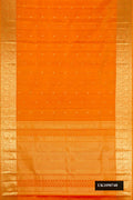 Mustard Dual Tone Kanchipuram Silk Saree with Zari Butta on the body and Zari Border.  displayed on a mannequin