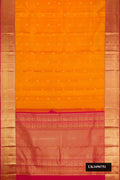 Mustard Dual Tone Kanchipuram Silk Saree with Zari Butta on the body and Zari Border.  displayed on a mannequin