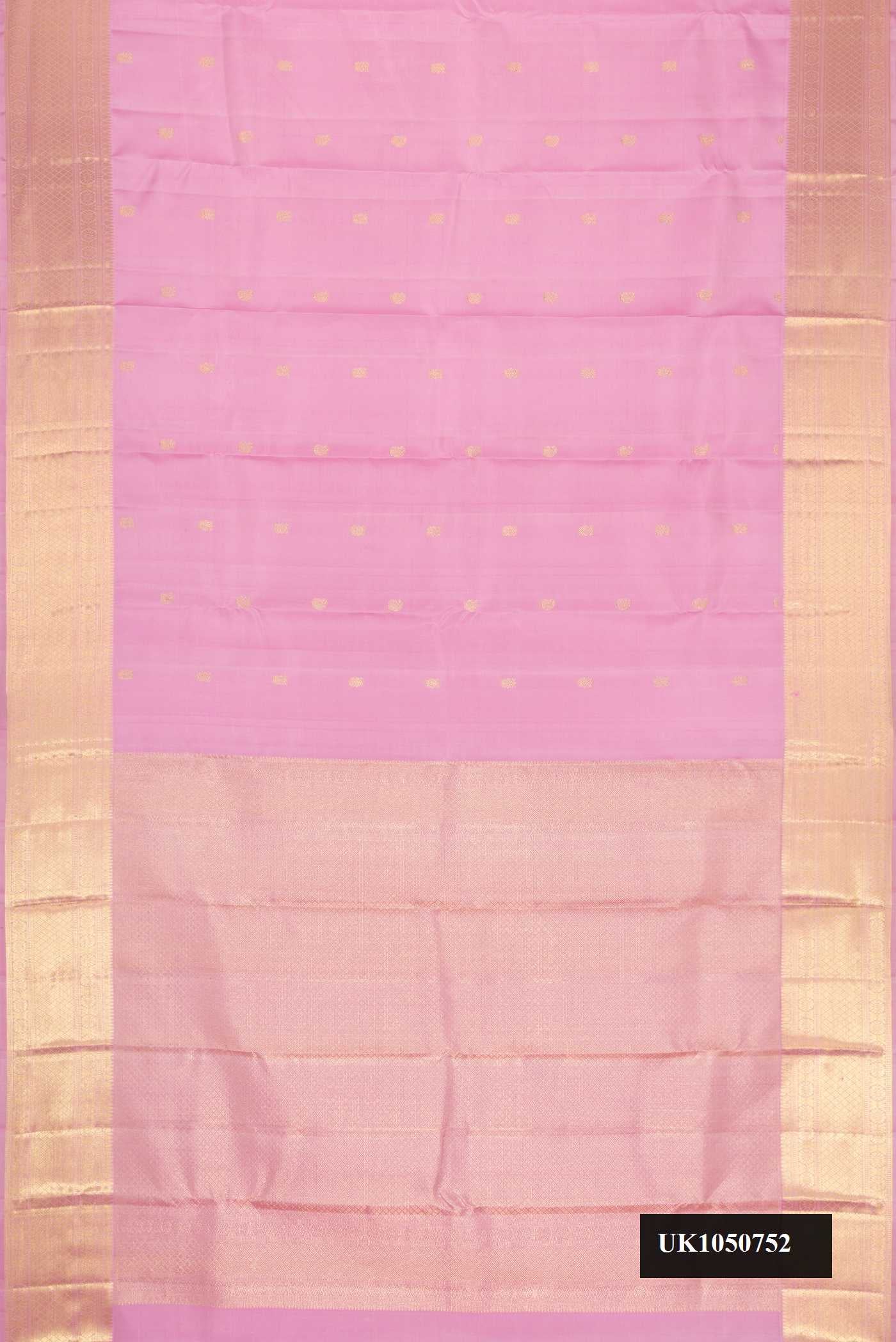 Pink Dual Tone Kanchipuram Silk Saree with Zari Butta on the body and Zari Border.  displayed on a mannequin