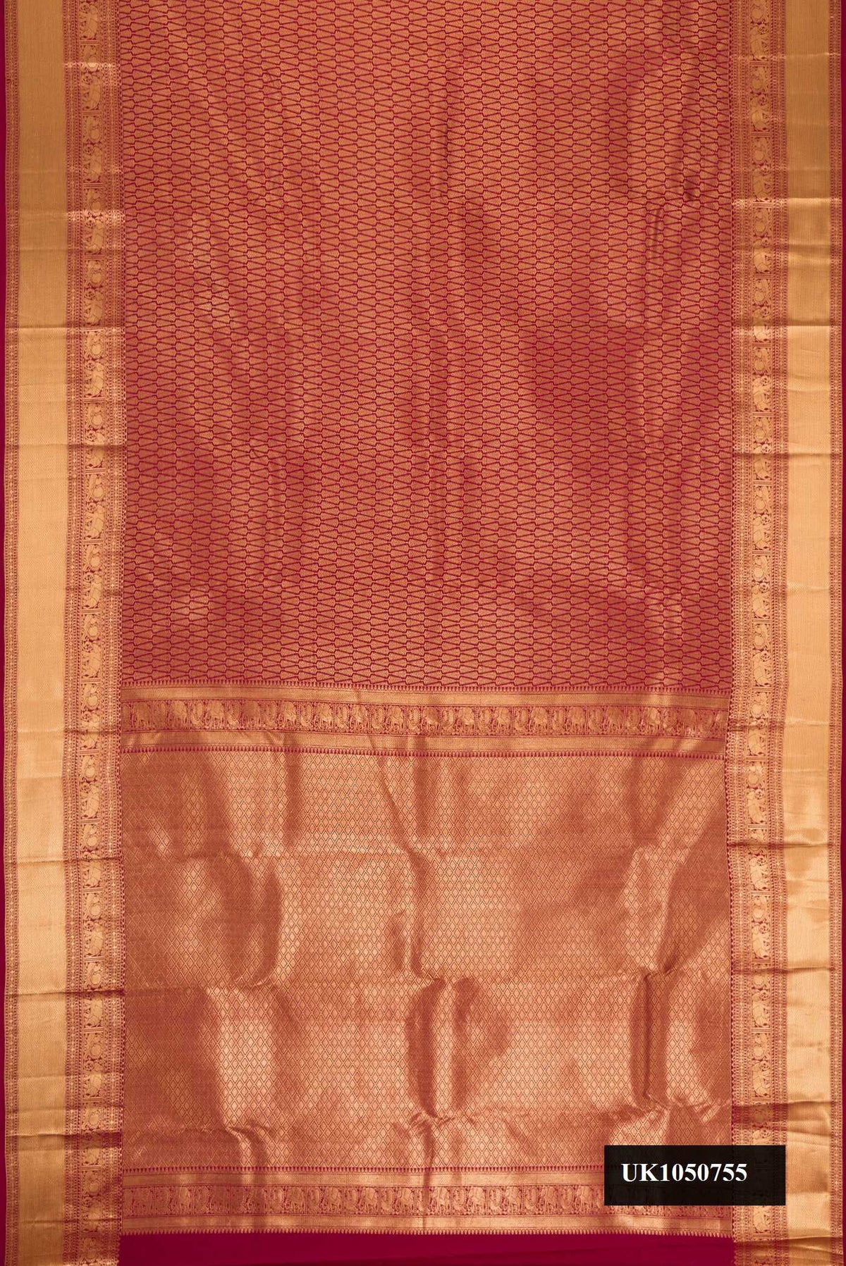 Maroon Dual Tone Kanchipuram Silk Saree with Zari Brocade on the body and Zari Border.  displayed on a mannequin