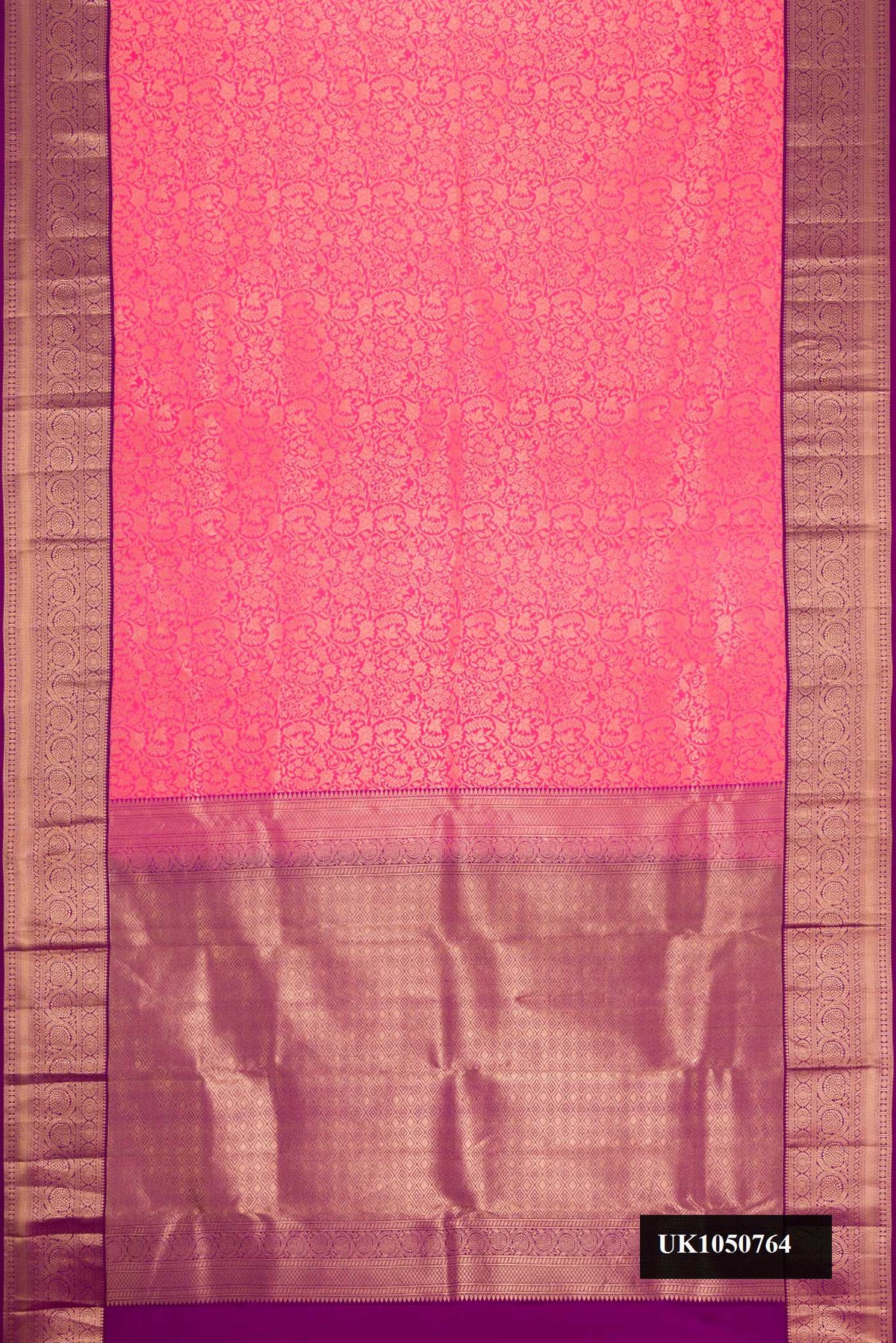 Pink Dual Tone Kanchipuram Silk Saree with Zari Brocade on the body and Zari Border.  displayed on a mannequin