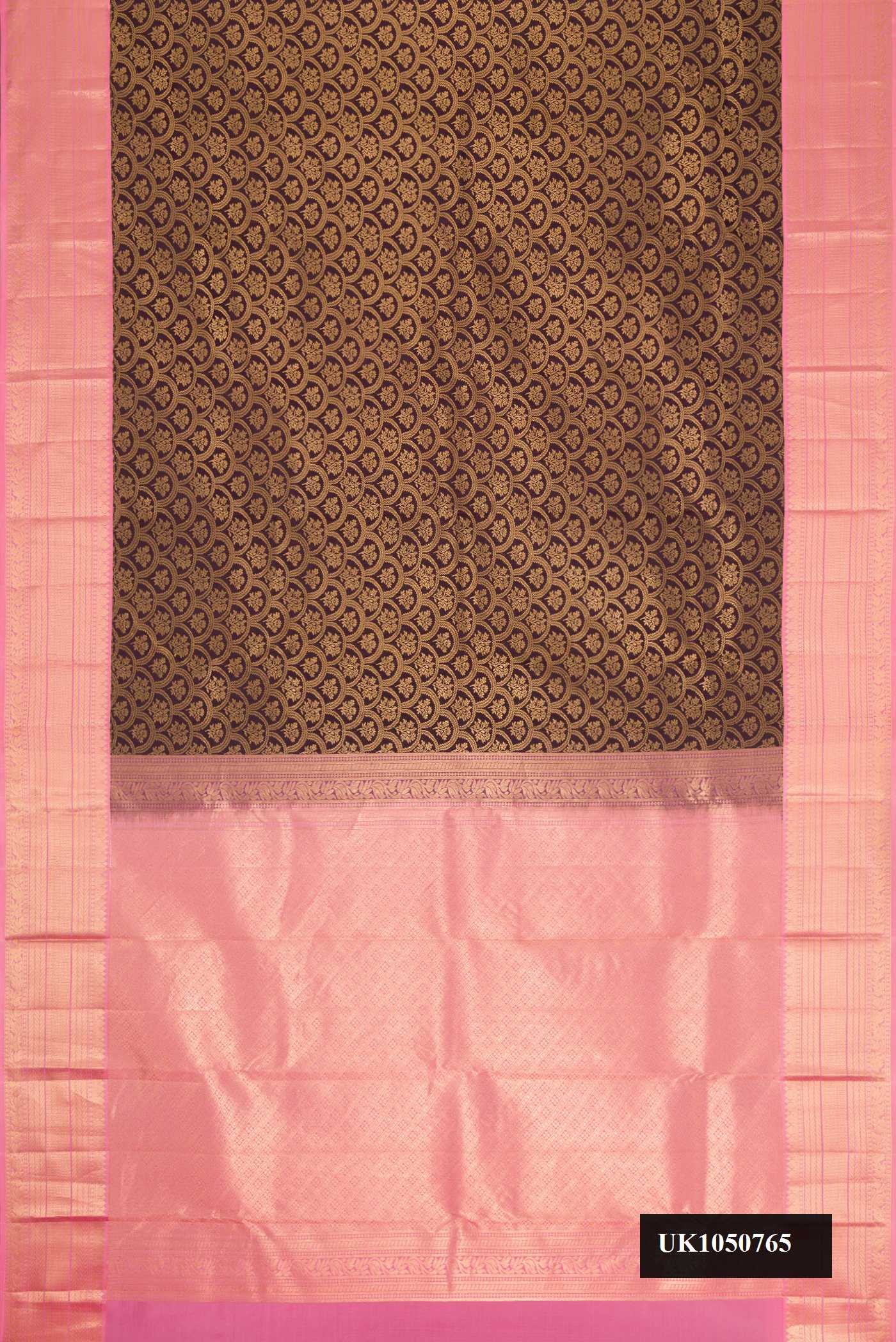 Brown Dual Tone Kanchipuram Silk Saree with Zari Brocade on the body and Zari Border.  displayed on a mannequin