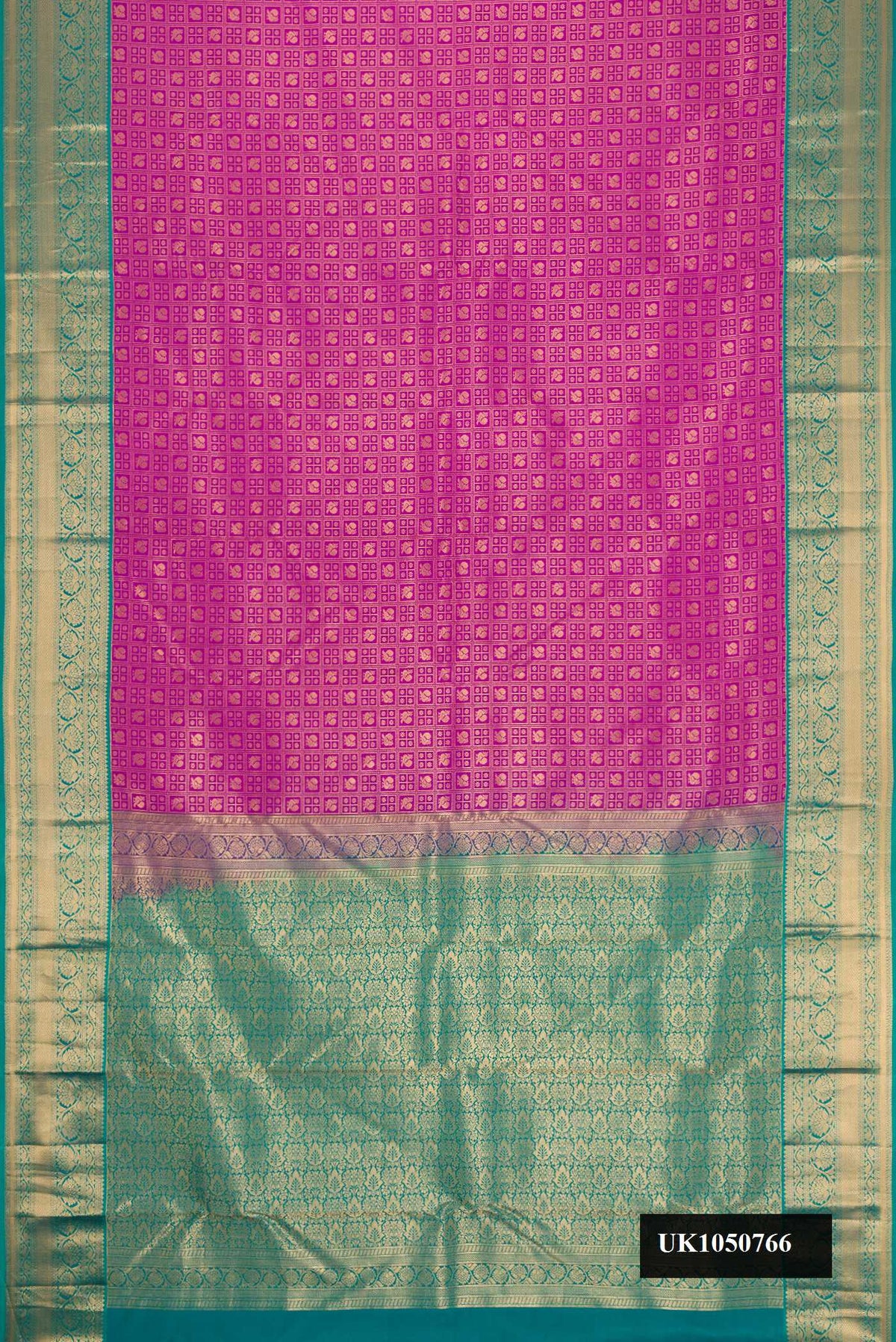 Purple Dual Tone Kanchipuram Silk Saree with Zari Brocade on the body and Zari Border.  displayed on a mannequin