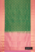 Green Dual Tone Kanchipuram Silk Saree with Zari Brocade on the body and Zari Border.  displayed on a mannequin