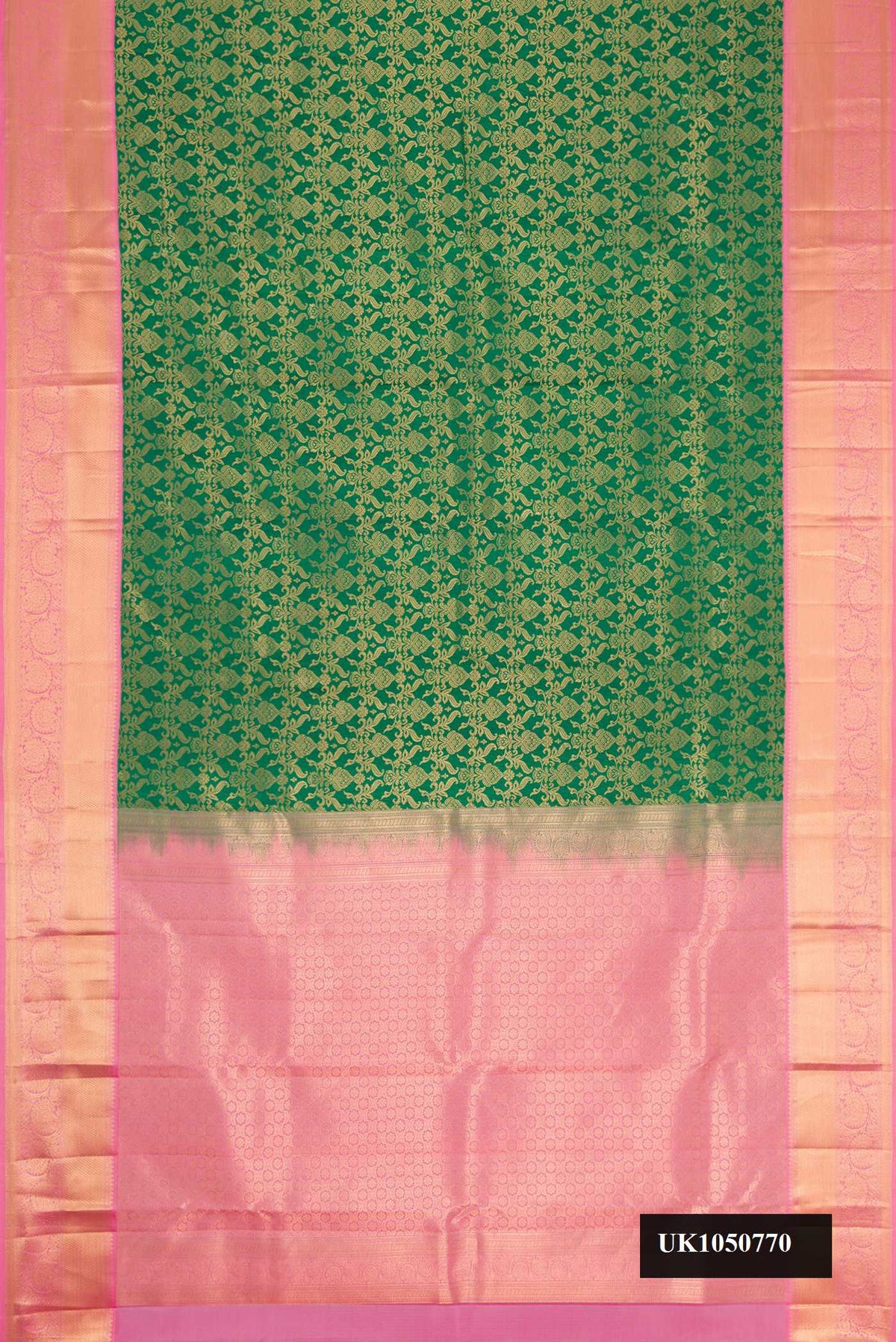 Green Dual Tone Kanchipuram Silk Saree with Zari Brocade on the body and Zari Border.  displayed on a mannequin