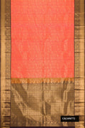 Coral Dual Tone Kanchipuram Silk Saree with Zari Brocade on the body and Zari Border.  displayed on a mannequin