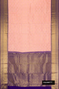Peach Dual Tone Kanchipuram Silk Saree with Zari Brocade on the body and Zari Border.  displayed on a mannequin
