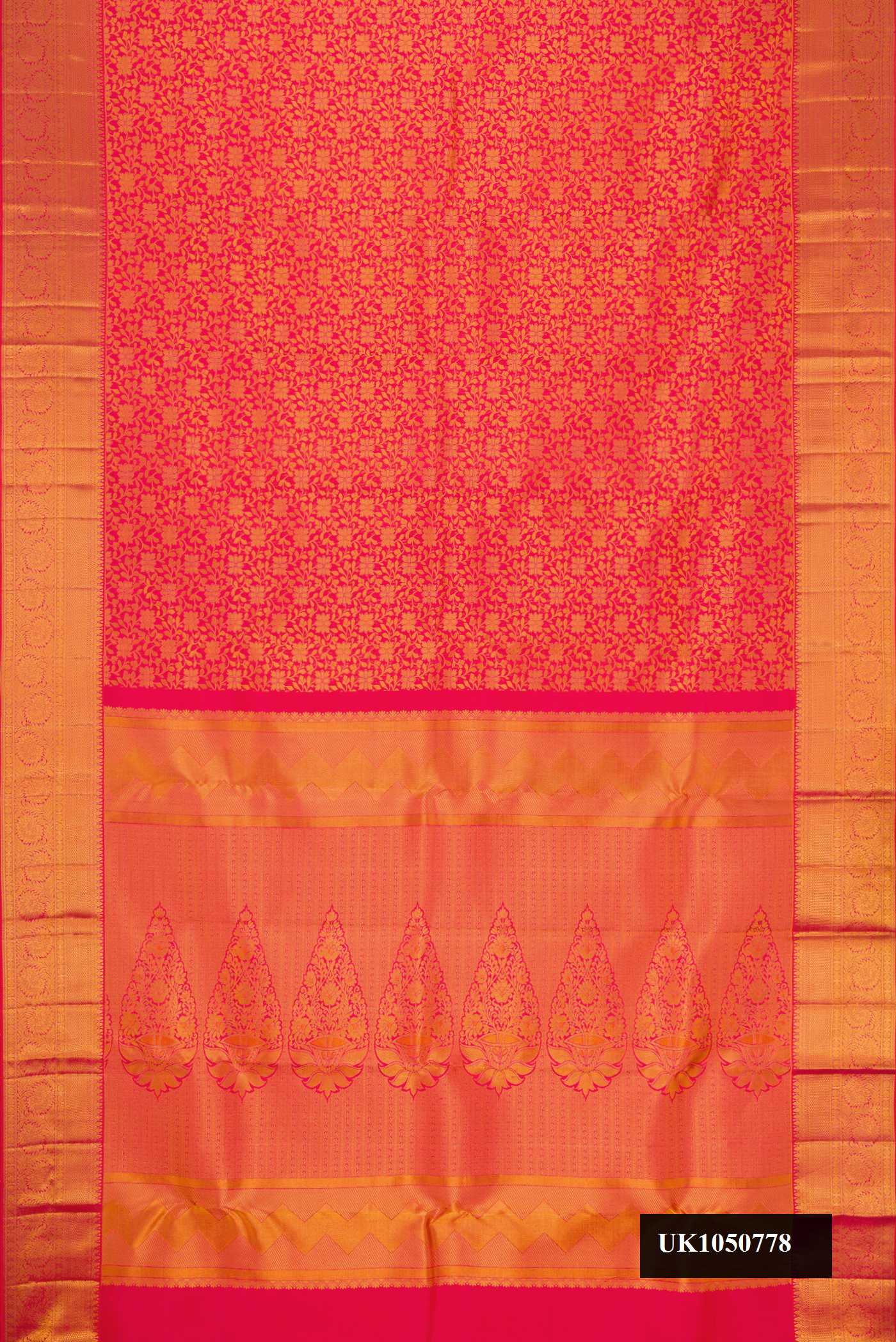 Dark Pink Dual Tone Kanchipuram Silk Saree with Zari Brocade on the body and Zari Border.  displayed on a mannequin