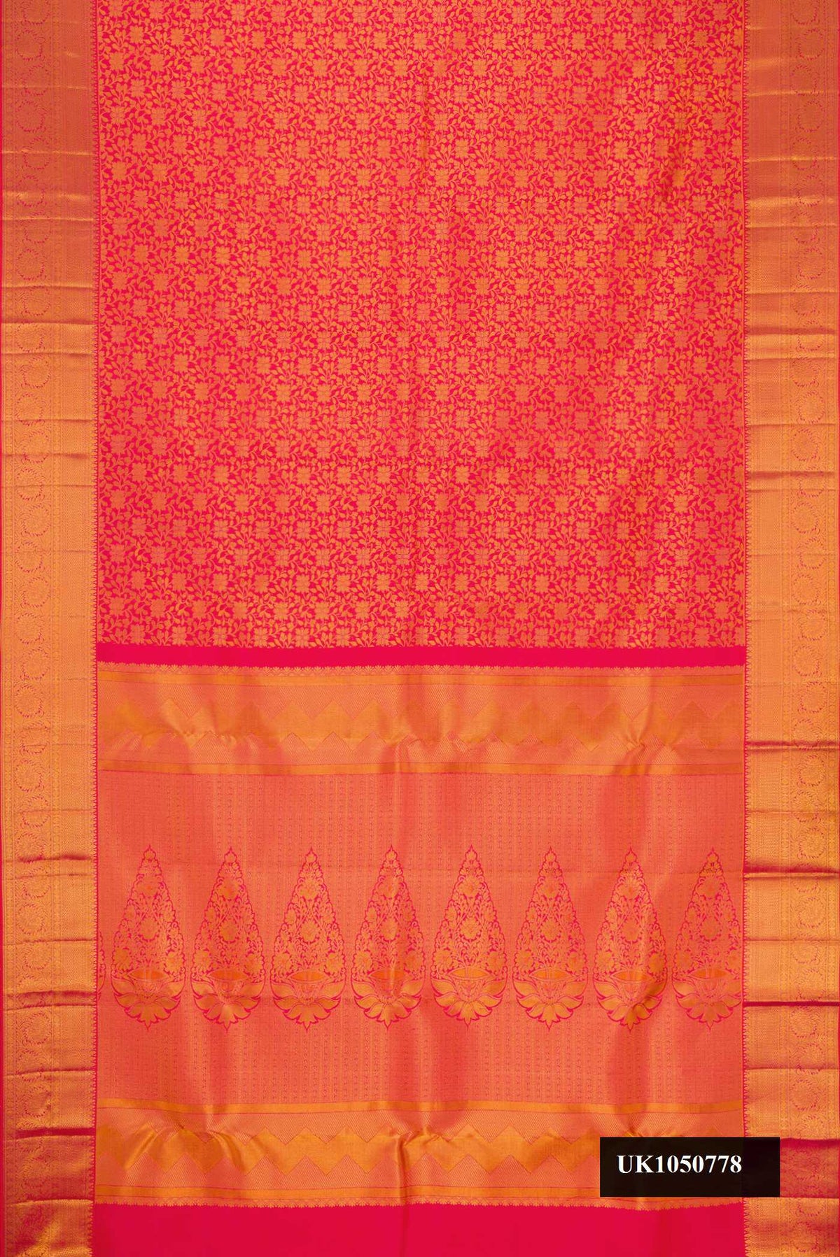 Dark Pink Dual Tone Kanchipuram Silk Saree with Zari Brocade on the body and Zari Border.  displayed on a mannequin