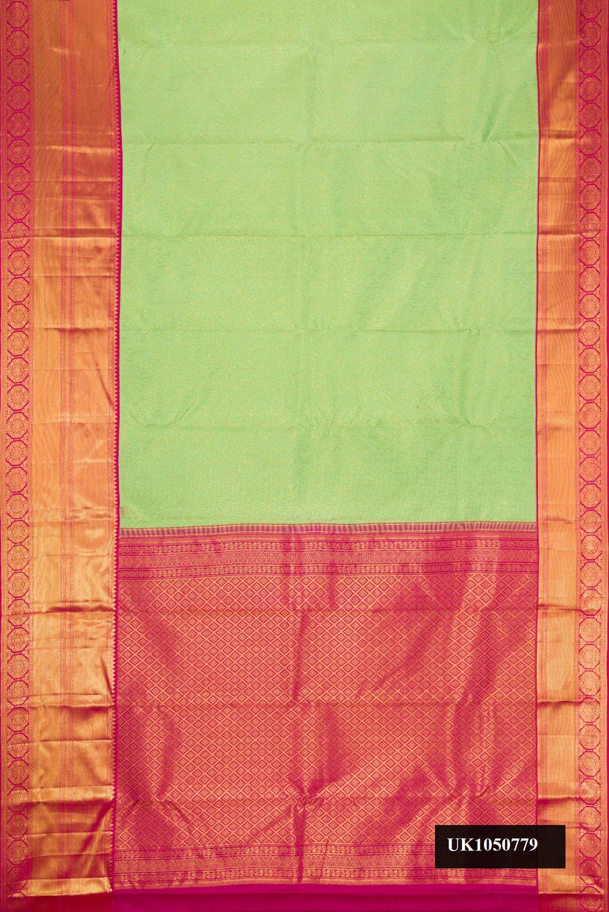 Parrot Green Dual Tone Kanchipuram Silk Saree with Zari Brocade on the body and Zari Border.  displayed on a mannequin