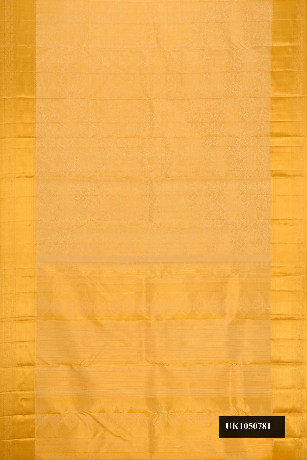 Gold Dual Tone Kanchipuram Silk Saree with Zari Brocade on the body and Zari Border.  displayed on a mannequin