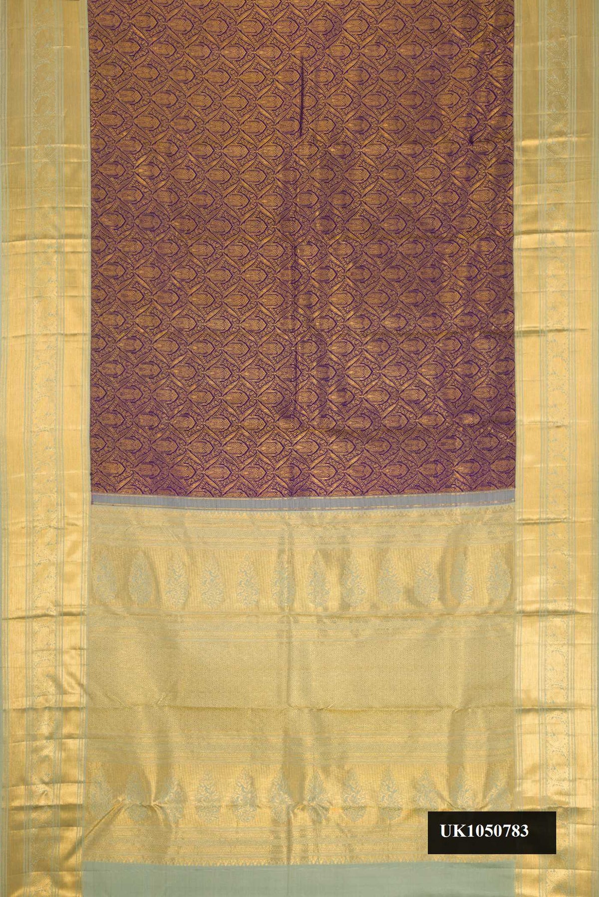 Navy Blue Dual Tone Kanchipuram Silk Saree with Zari Brocade on the body and Zari Border.  displayed on a mannequin