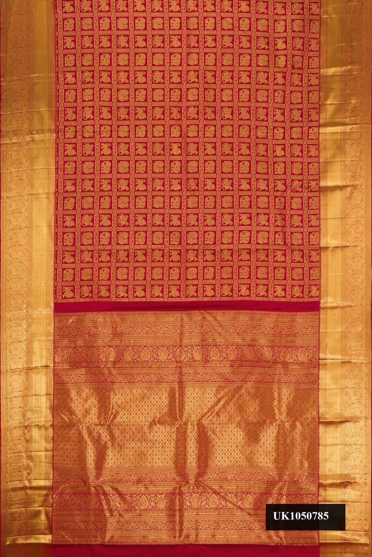 Maroon Dual Tone Kanchipuram Silk Saree with Zari Brocade on the body and Zari Border.  displayed on a mannequin