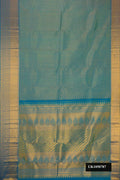Peacock Blue Dual Tone Kanchipuram Silk Saree with Zari Brocade on the body and Zari Border.  displayed on a mannequin