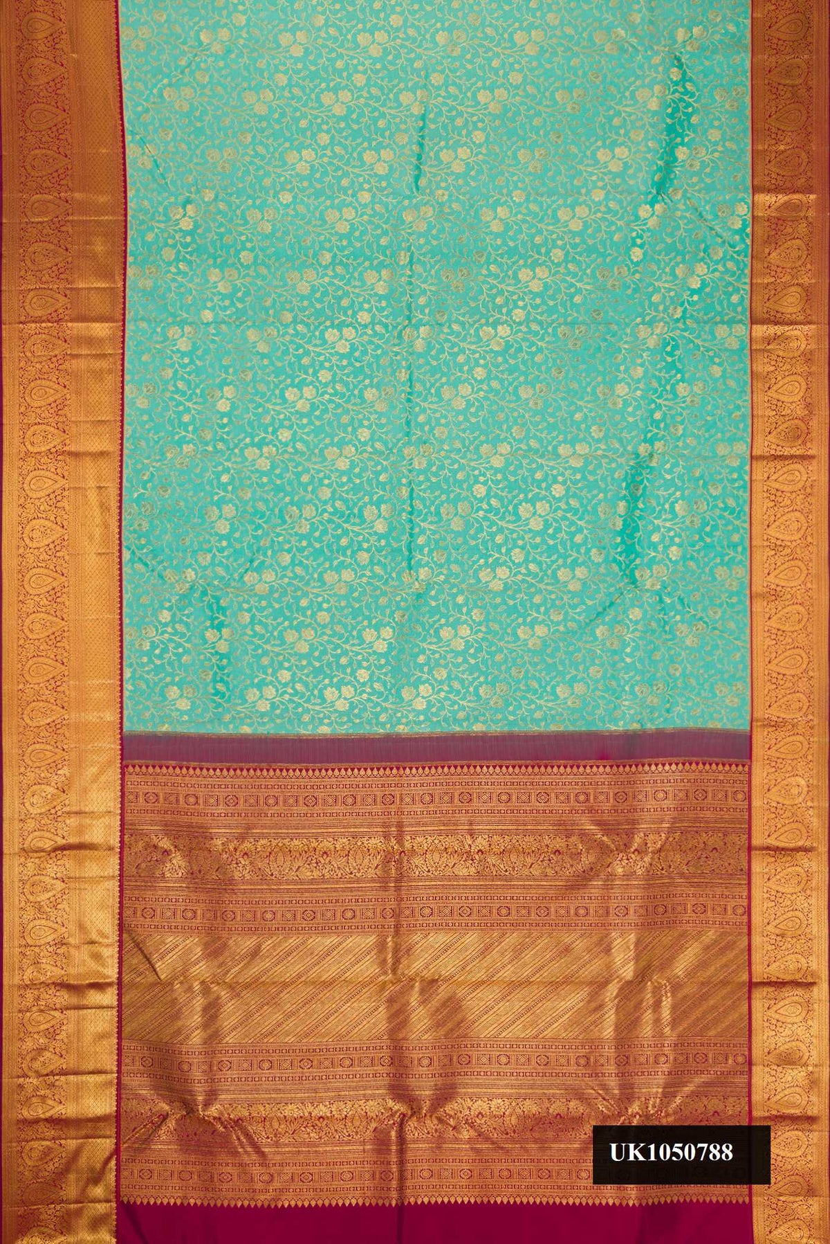 Sea Green Dual Tone Kanchipuram Silk Saree with Zari Brocade on the body and Zari Border.  displayed on a mannequin