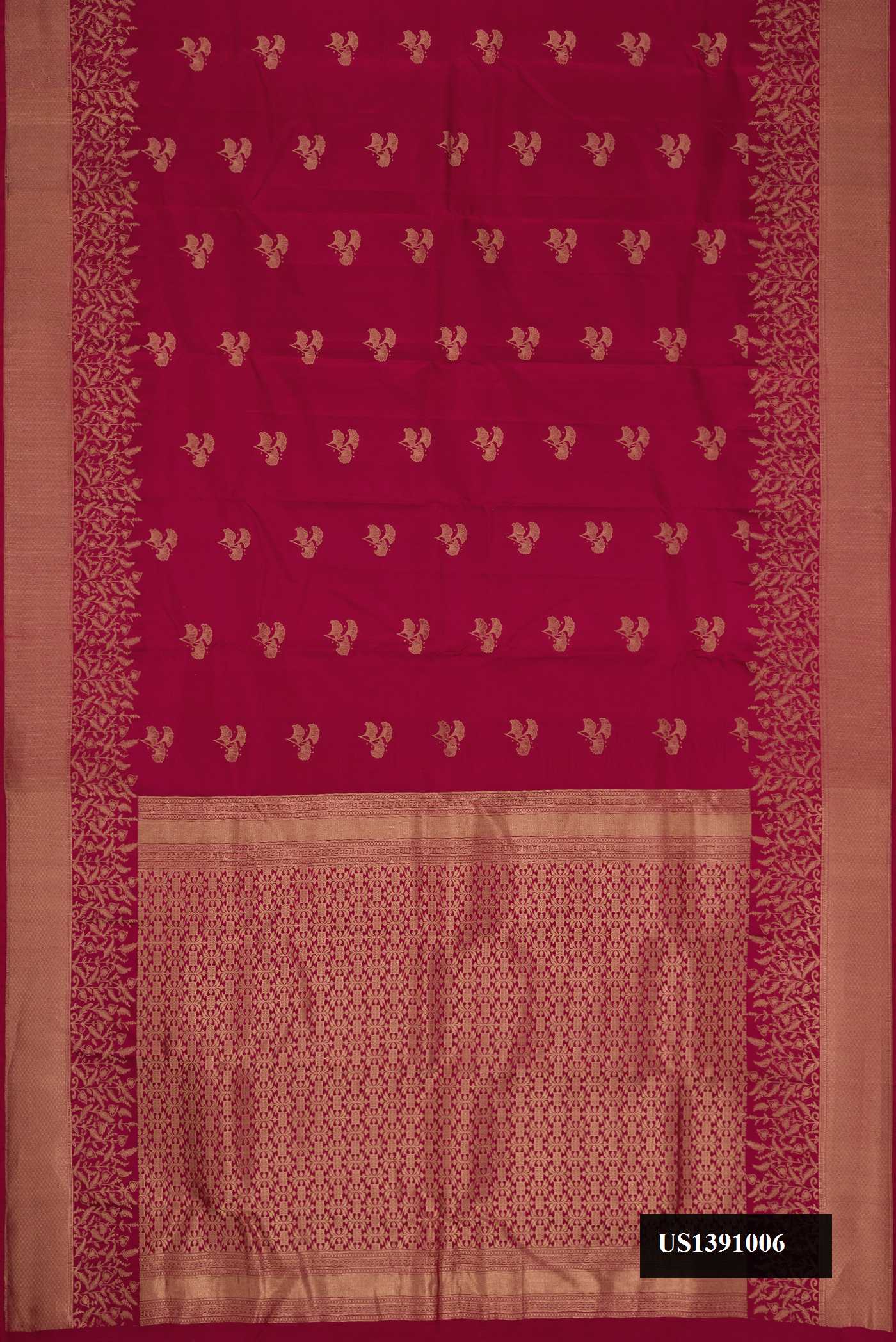 Maroon Dual Tone Kanchipuram Silk Saree with Zari Butta on the body and Zari Border.  displayed on a mannequin