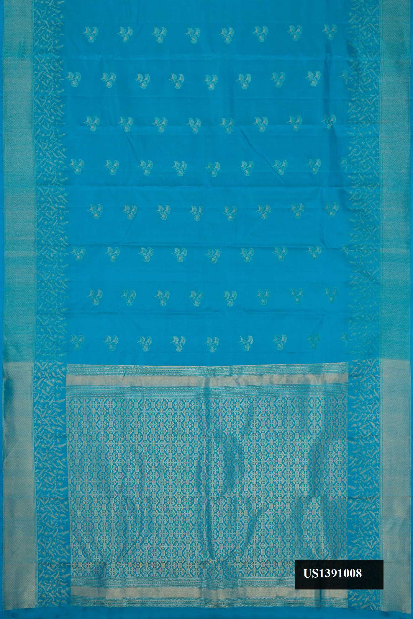 Sky Blue Dual Tone Kanchipuram Silk Saree with Zari Butta on the body and Zari Border.  displayed on a mannequin