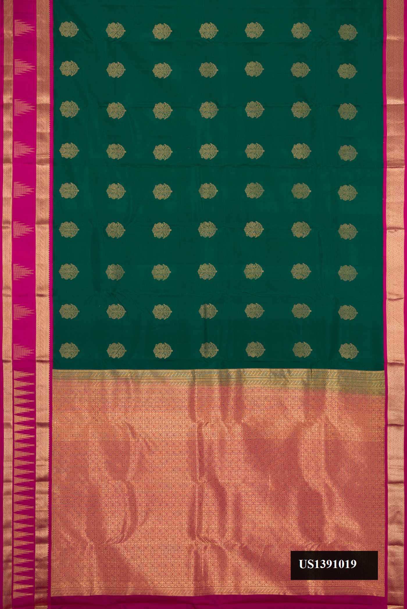 Bottle Green Dual Tone Kanchipuram Silk Saree with Zari Butta on the body and Zari Border.  displayed on a mannequin