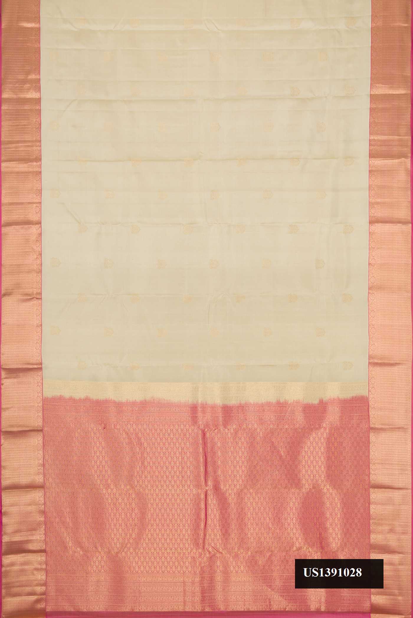 Beige Dual Tone Kanchipuram Silk Saree with Zari Butta on the body and Zari Border.  displayed on a mannequin