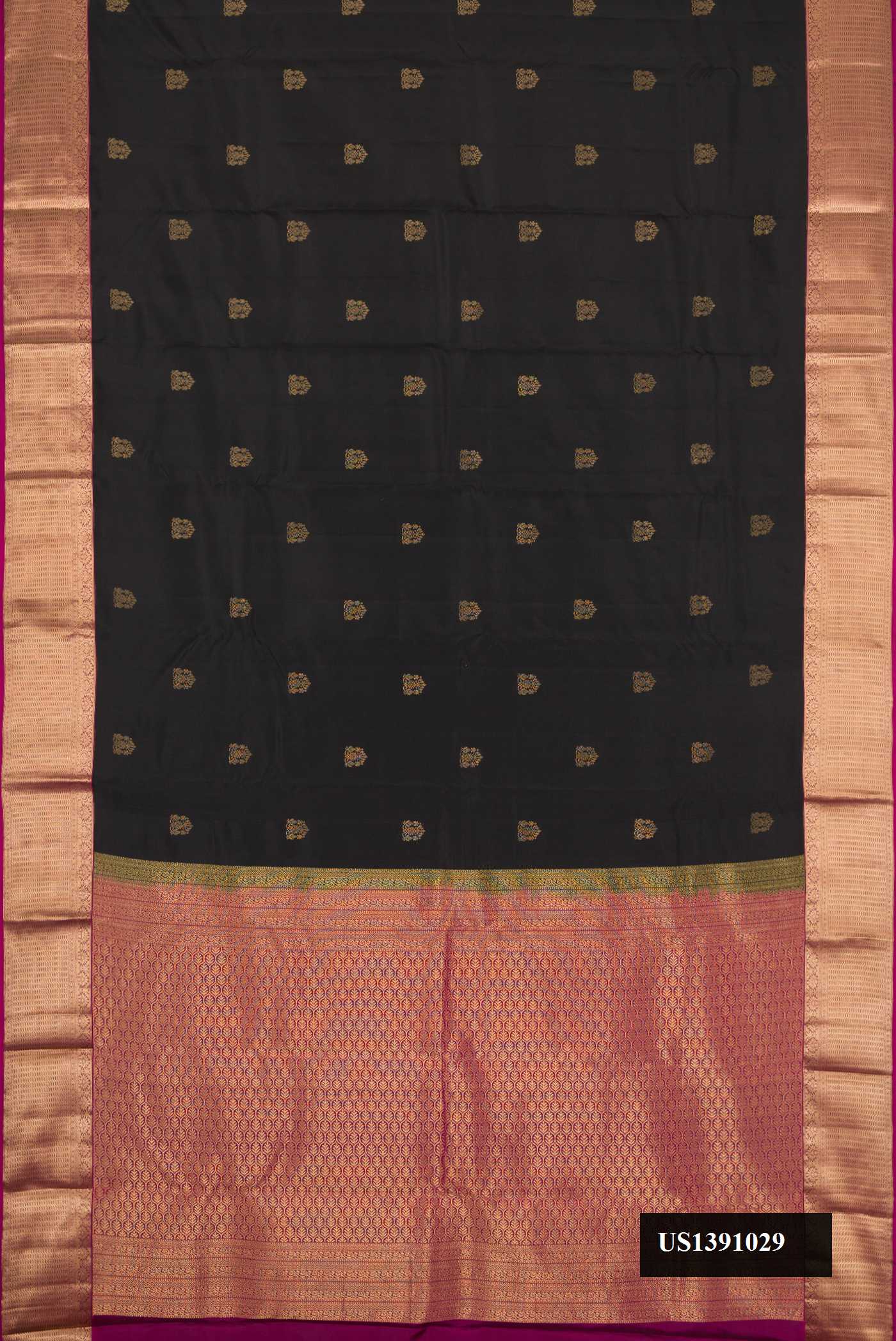 Black Dual Tone Kanchipuram Silk Saree with Zari Butta on the body and Zari Border.  displayed on a mannequin