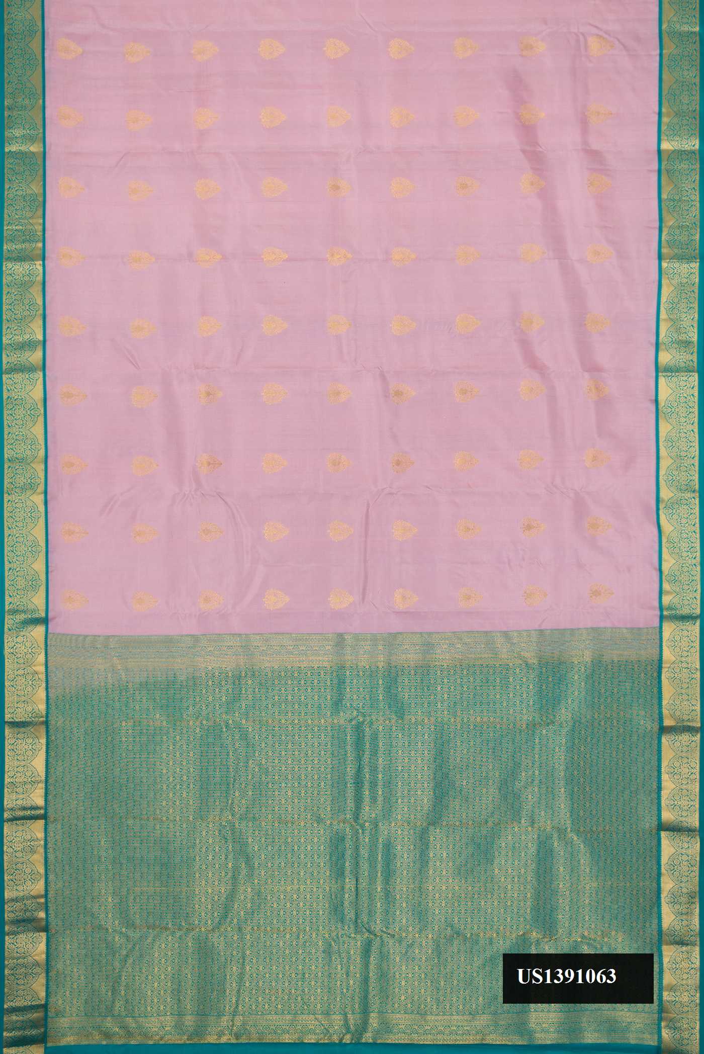 Lavender Dual Tone Kanchipuram Silk Saree with Zari Butta on the body and Zari Border.  displayed on a mannequin