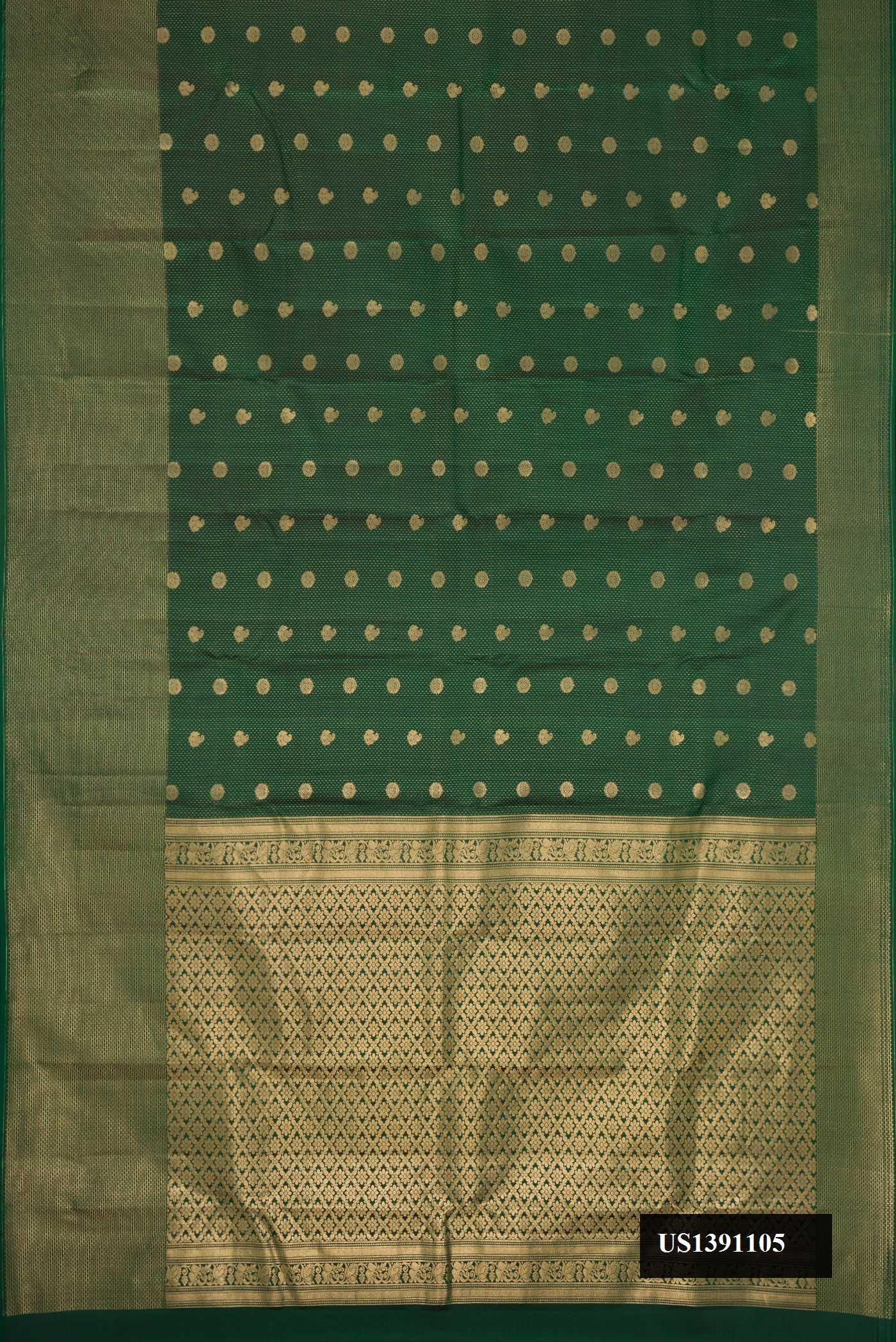 Green Dual Tone Kanchipuram Silk Saree with Zari Butta on the body and Zari Border.  displayed on a mannequin