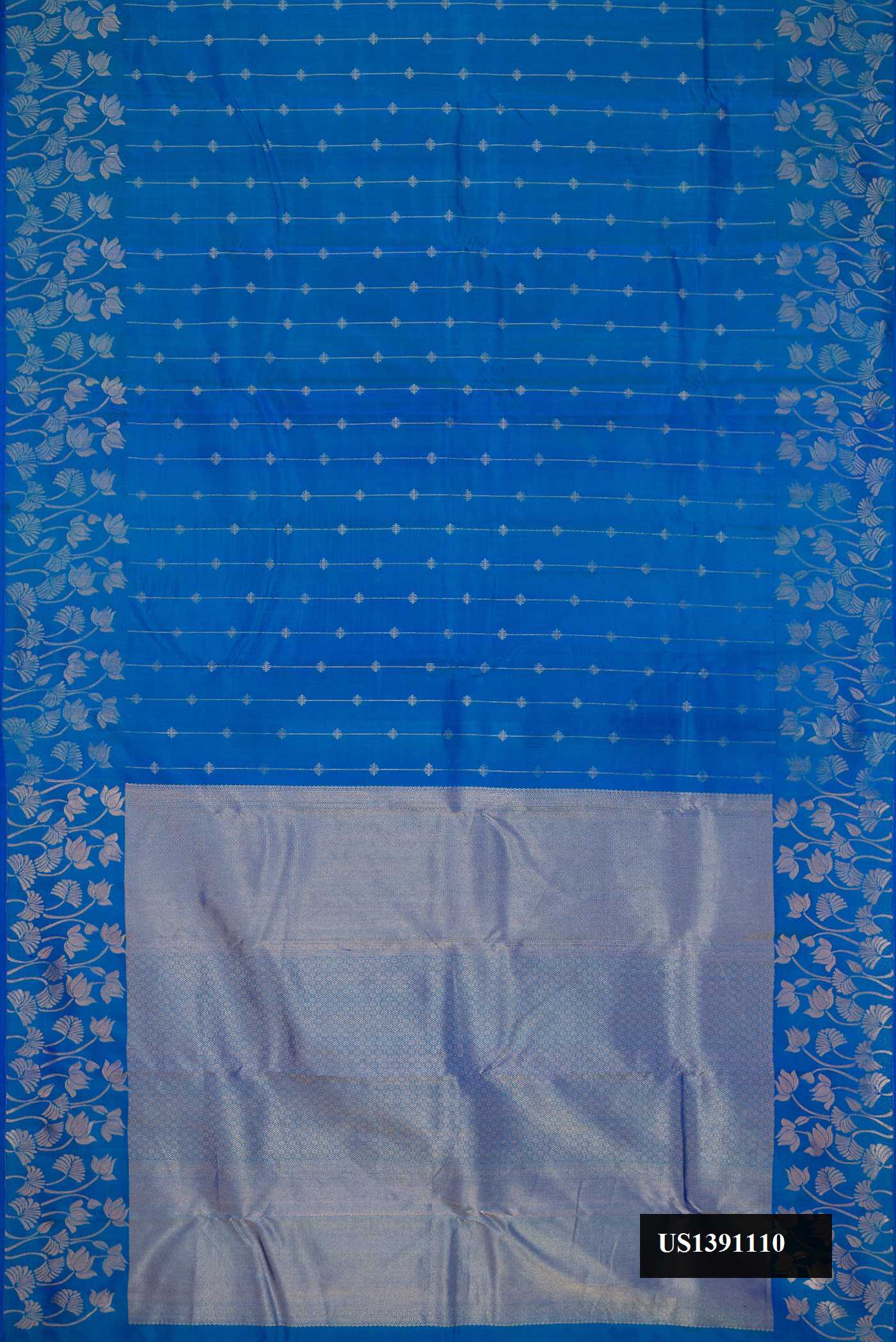 Peacock Blue Dual Tone Kanchipuram Silk Saree with Stripes on the body and Fancy Border.  displayed on a mannequin